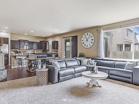 Quintessential open floor plan connects the Family Room to the Dining Room and Kitchen excellent for entertaining.
