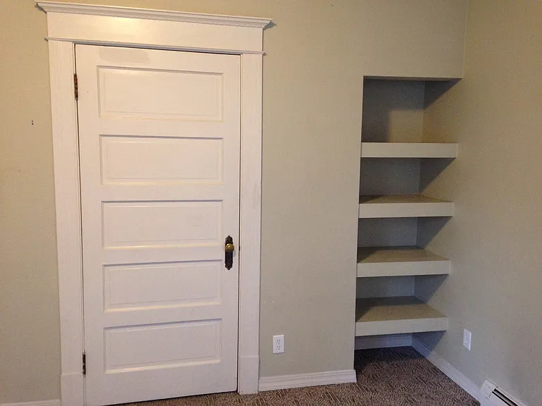 Built in shelving in bedroom. Some units may differ.
