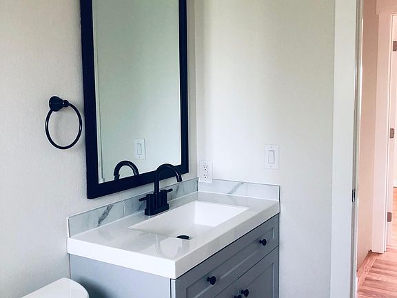 Master bathroom with large quartz top, modern vanity