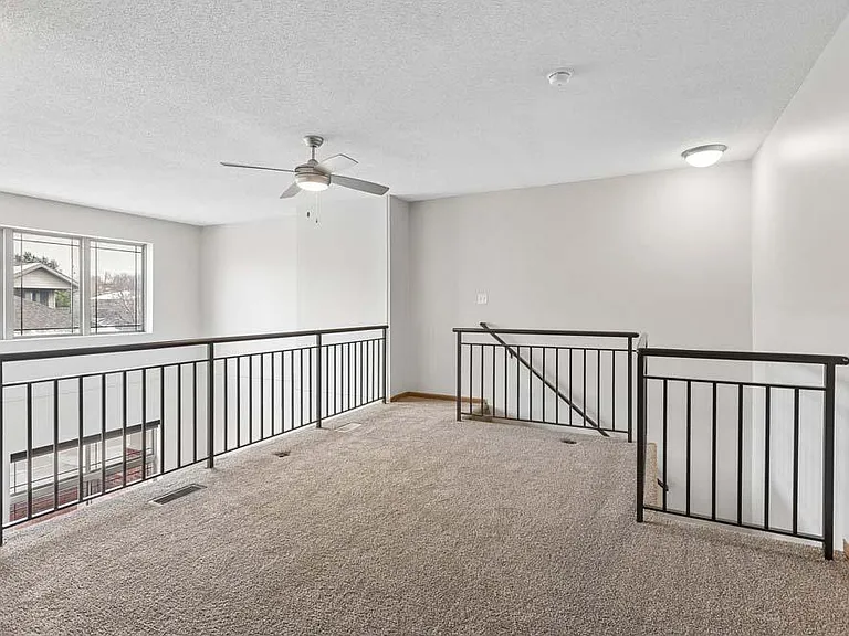 A versatile loft-style space filled with natural light, perfect for unwinding, working, or creating a cozy retreat of your own.