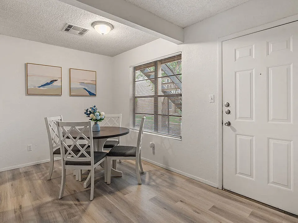 Dining Area with Wood Style Flooring