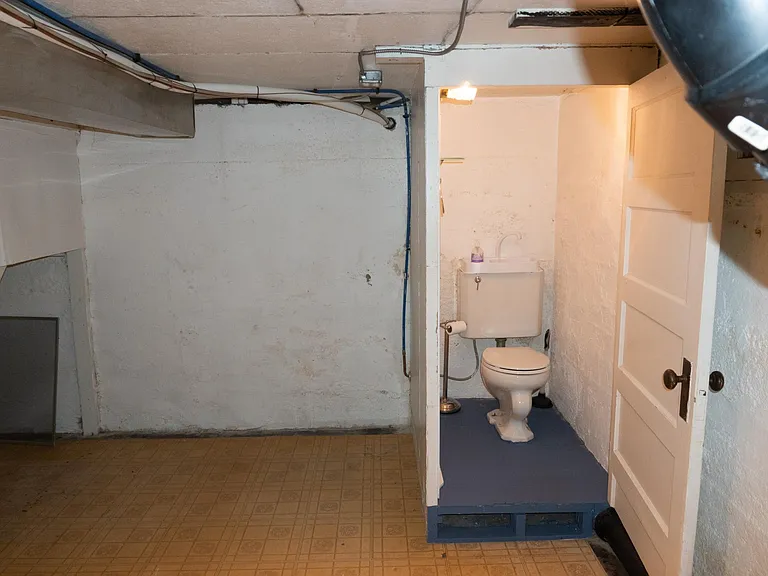 Basement Northside with 1/2 bath.