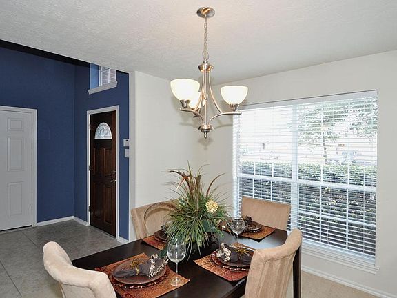 Another view of formal dining open to foyer