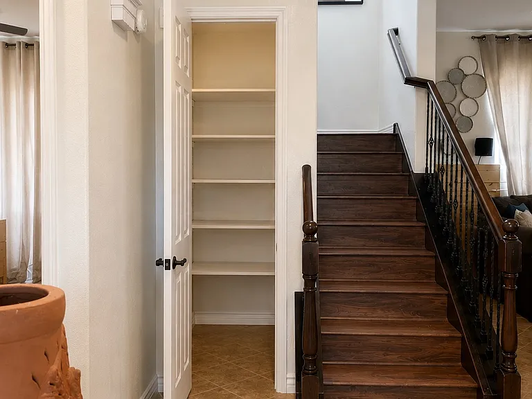 coat rack/shoe closet/under stairs storage area