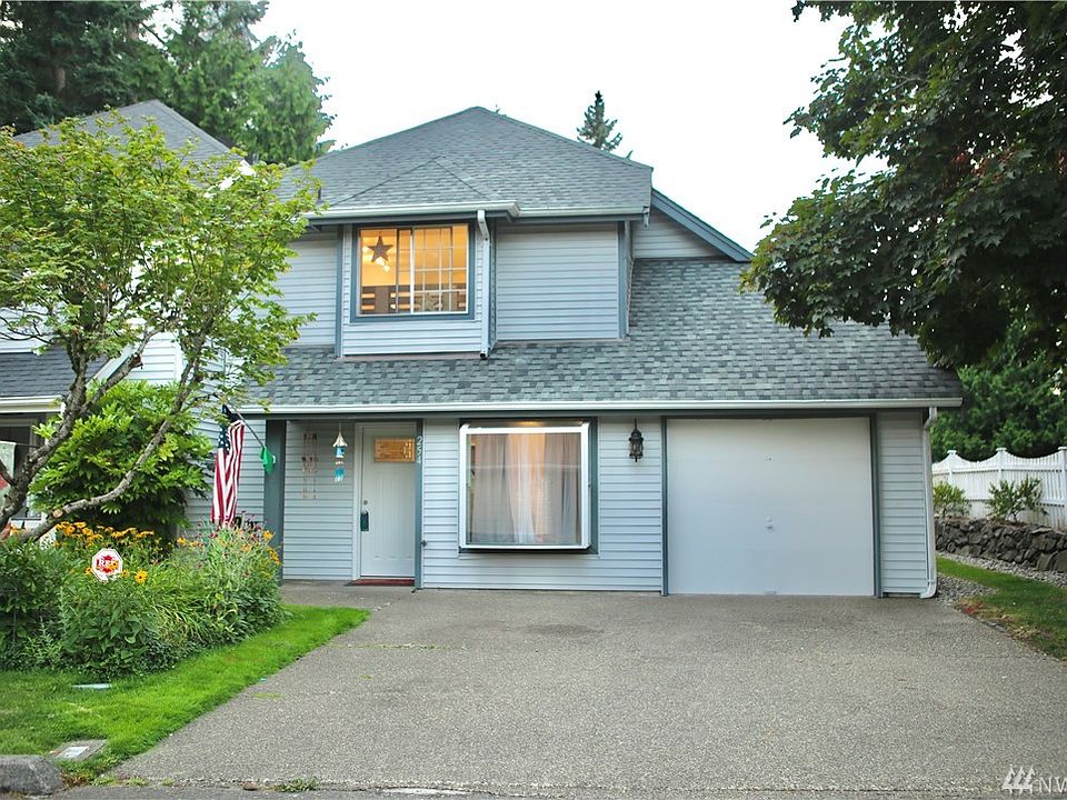 Welcome to your new townhome! The home faces south, with two care driveway and cool front window with seating. Brand new front door as well