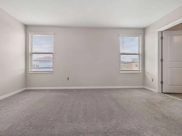 7407 Rosy Periwinkle Ct — Photo 13