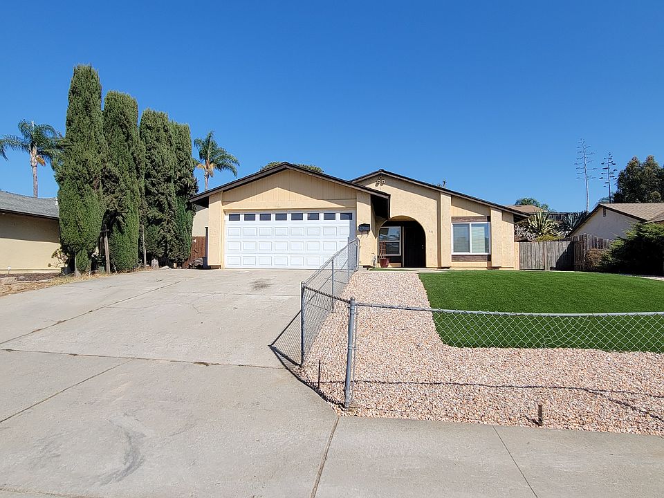 low maintenance and fenced in front yard.