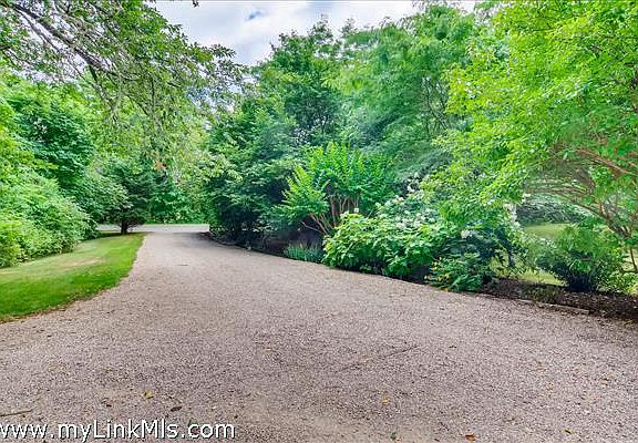 Driveway with mature trees