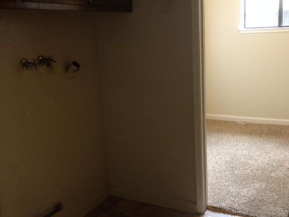utility room with bonus room