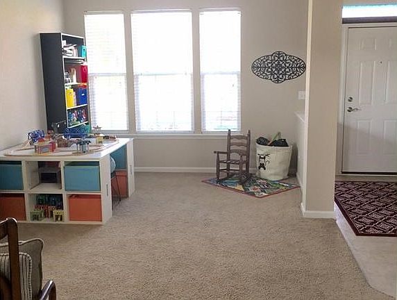 Living Room off 2 story foyer with 9 foot ceilings throughout.