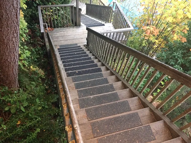Stairs to homes on beach. Groceries are walked down, trash back up. Don't forget your keys.