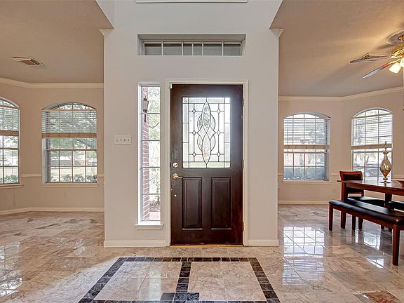 Enter through this lovely Wood Door with Glass Insert, You are Home!!! Living Large in this Texas Sized Home with 3335 Square Feet! It actually feels much bigger as you walk through this incredible Houston home!