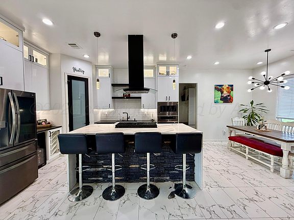 5th image of 10820 Travis Ln