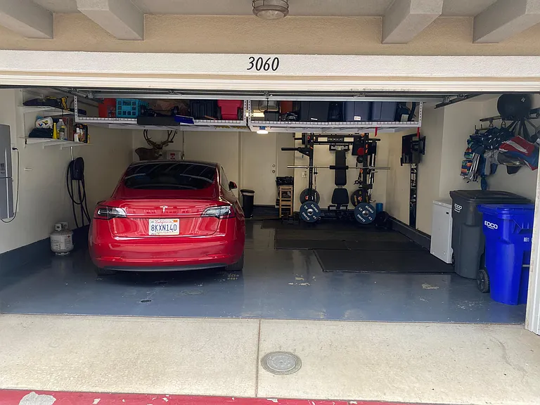 2 car garage with storage above to the left and right