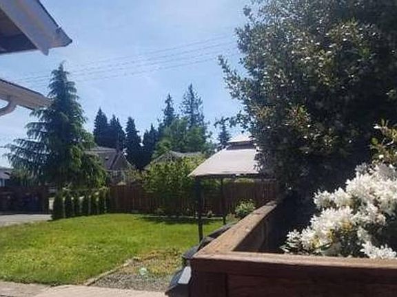 Quiet yard with private off street parking for 3 cars.