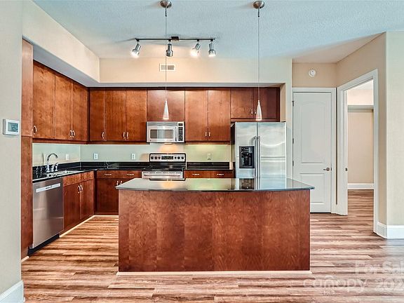 3rd image of 4625 Piedmont Row Dr Unit 411