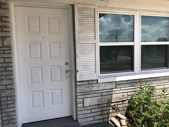 Living room with double window allows in natural light