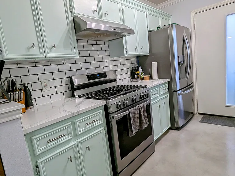 View of the kitchen area and appliances