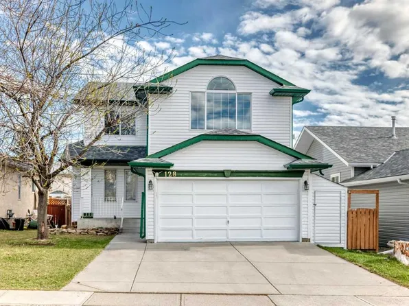128 SW Harvest Park Rd NE, Calgary, AB T3K 4H9