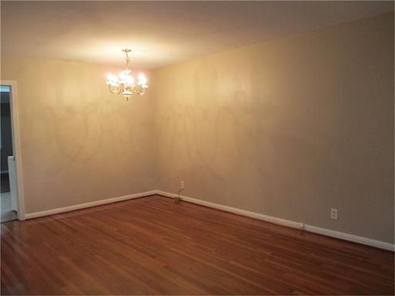 The living room/dining room combo is flexible for every day living.