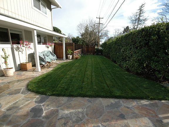 Newly landscaped with flagstone porch and walkway