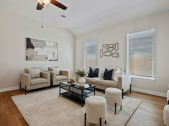 Large family room with a view of the private backyard
