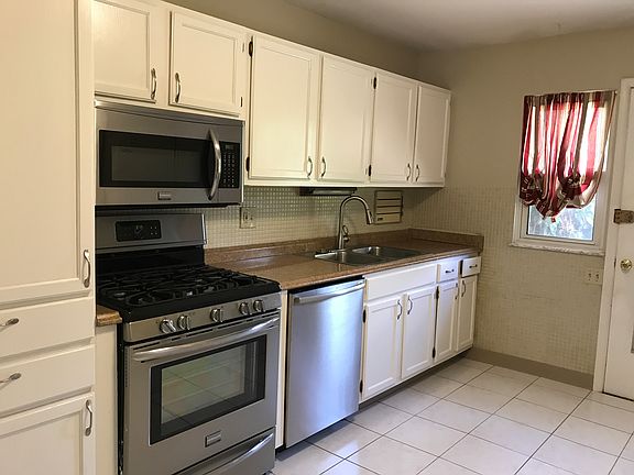 Kitchen with door to patio. 