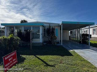 905 Pecan Cir, Barefoot Bay, FL 32976