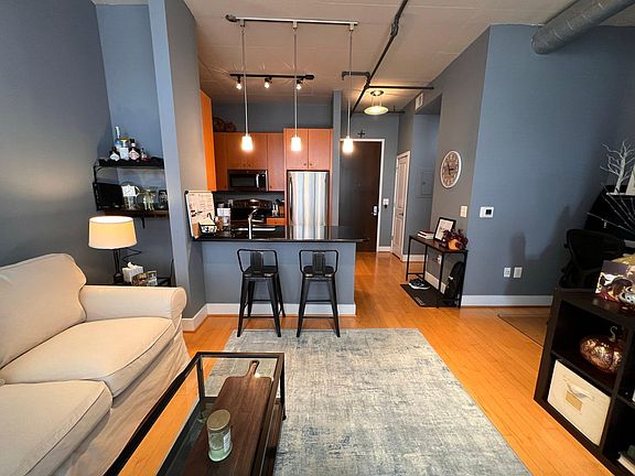 Living Room with view to entrance of condo