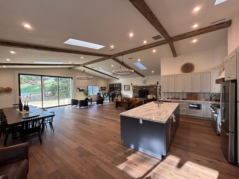 Amazing great room with 10ft La Cantina doors.