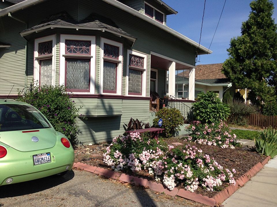 Side of House by Driveway