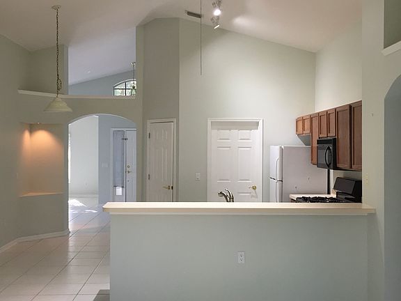 Kitchen opens to living room