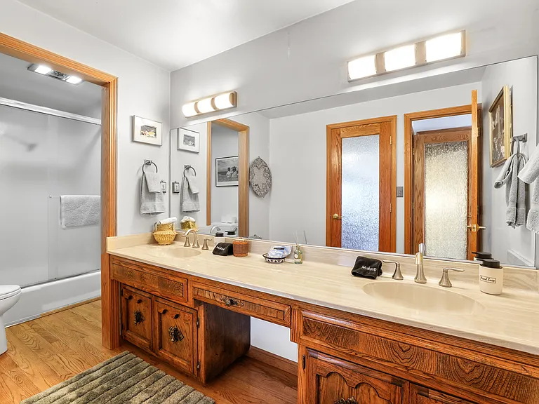 First floor full bathroom. Located off the kitchen and next to the first floor bedroom.