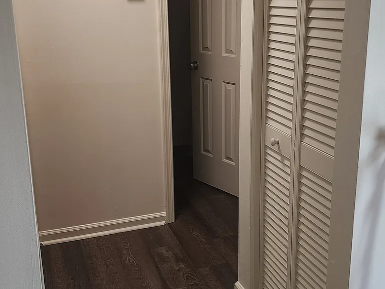 Hallway to bedrooms and bath.
