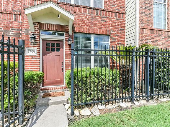Brand new front door and adorable Lone Star exterior lighting.