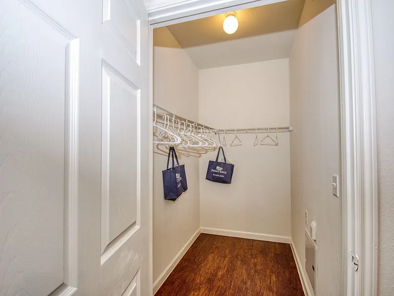 Walk-in closet with built-in storage space