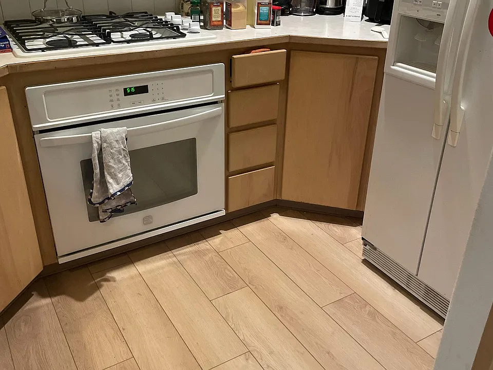 New Floor Installed in 2024 for living room, kitchen, and bathroom on 1st floor