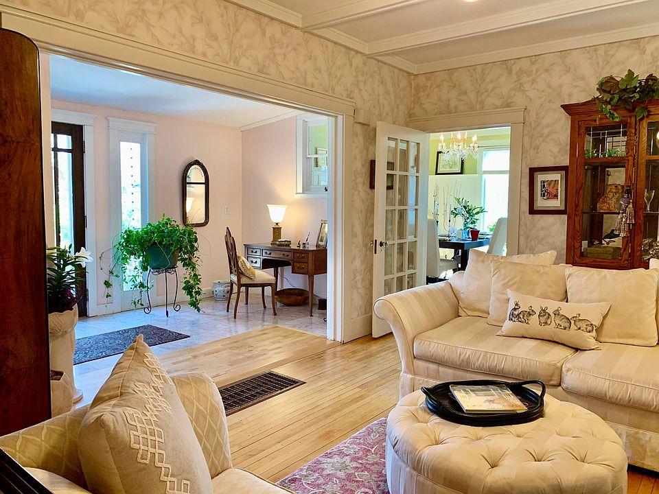 Living room towards foyer with desk