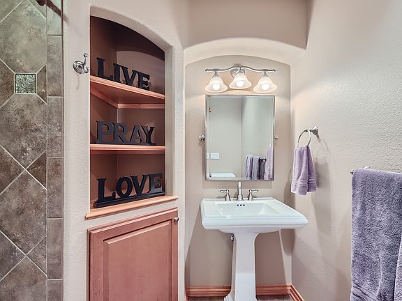 Lower level private bathroom with both shower and bath