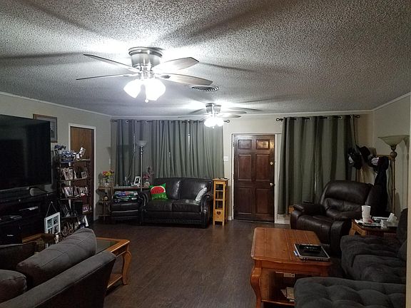 Living room and front bedroom is off the living room or could be used as an office.