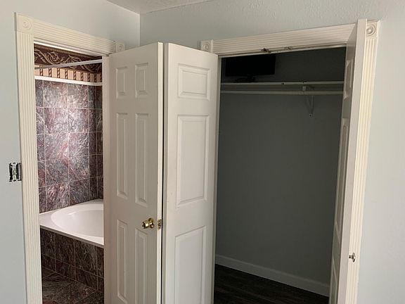 Closet and bathroom in master