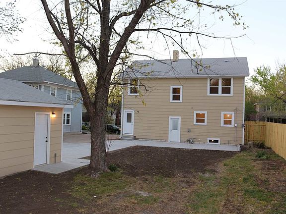Back of house.  Yard is fenced. New patio