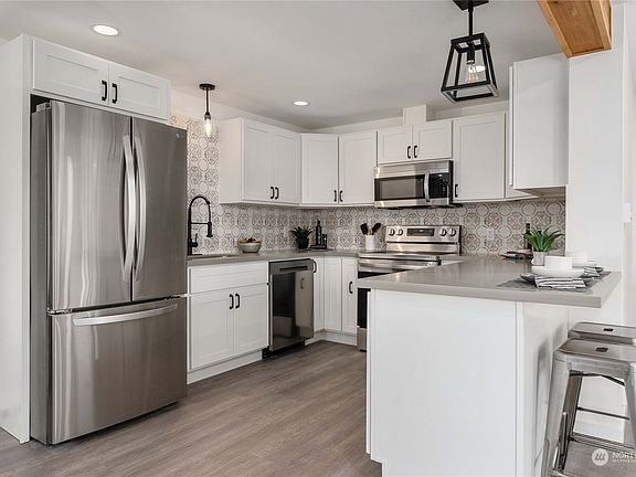 4th image of 3002 S Puget Sound Ave