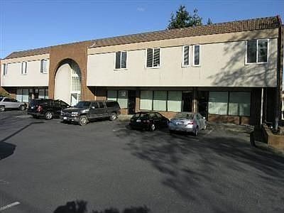 Front of building on 1st Ave S. Tons of parking.