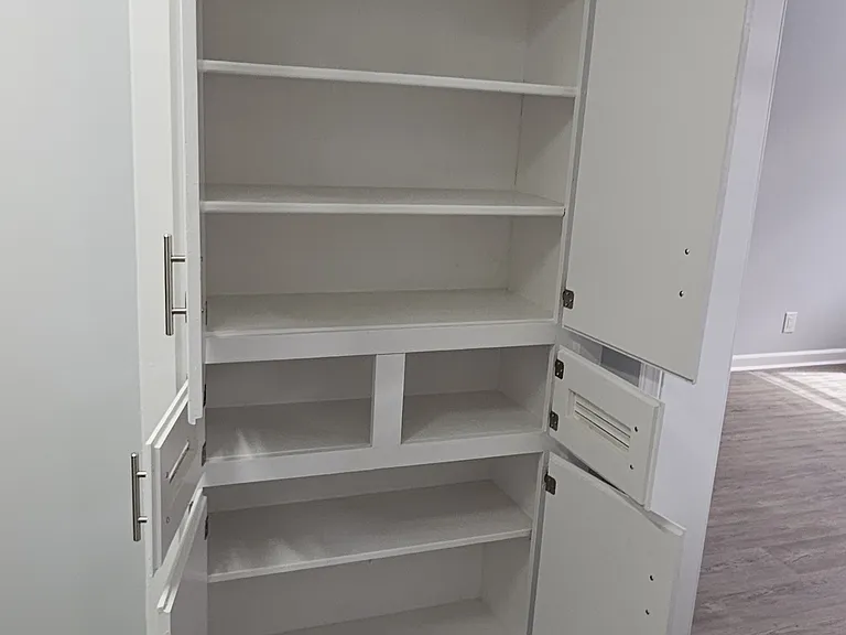 Extra storage area in primary bedroom