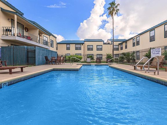 RELAX BESIDE OUR SPARKLING SWIMMING POOL