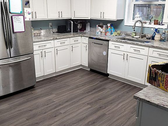Large kitchen with granite counters