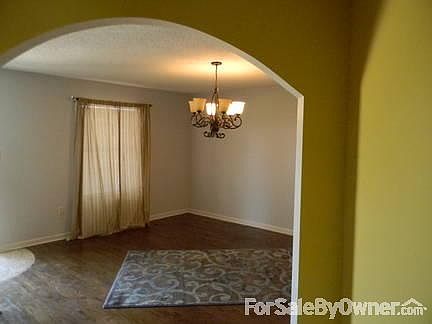arched openings
						:
						2 large arched doorways give an open & Italian feel to this Tuscany styled decor