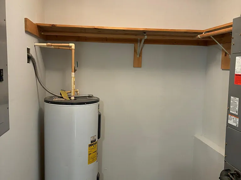Water heater / storage room