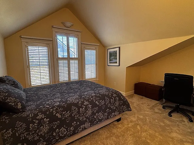 Second bedroom (east facing) with standing adjustable desk